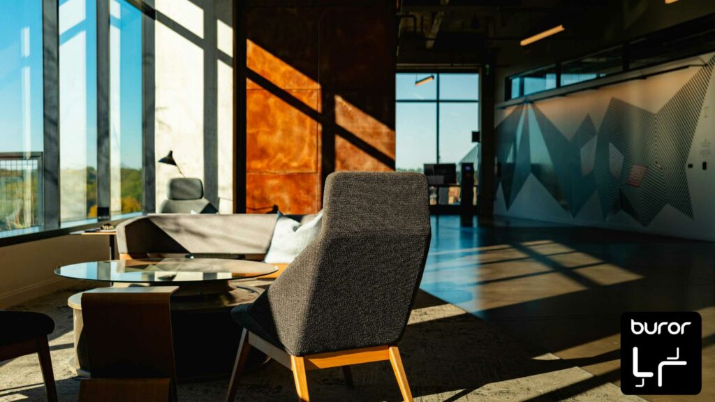 Créer une ambiance chaleureuse au bureau grâce à la déco : le guide complet 1 petit salon de travail